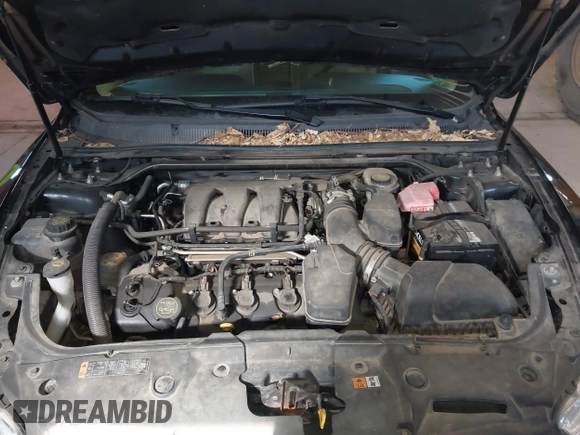 2015 Ford Taurus Limited with VIN 1FAHP2J87FG172580, listed as a IAAI auction lot 41891567 with 183,784 mi miles. Bid and sale history available at carsss.com. Image 10.