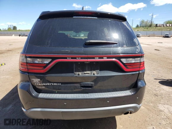 2014 Dodge Durango SXT with VIN 1C4RDJAG1EC972595, listed as a Copart auction lot 57133105 with 126,011 mi miles and Clean title. Bid and sale history available at DreamBid. Image 6.