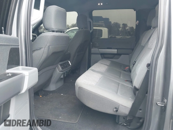 2023 Ford F-150 Lightning Pro with VIN 1FTVW1EL8PWG48559, listed as a IAAI auction lot 42033123 with 8,845 mi miles and . Bid and sale history available at DreamBid. Image 8.
