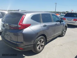 2017 Honda CR-V LX with VIN 7FARW5H33HE014039, listed as a IAAI auction lot 41830031 with 85,730 mi miles. Bid and sale history available at carsss.com. Image 4.
