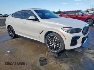 2023 BMW X6 xDrive40i z VIN 5UXCY6C08P9N43749, wystawiony jako Copart lot #54092795 z przebiegiem 39 495 mil mil oraz Szkody całkowita. Historia ofert i sprzedaży dostępna na DreamBid. Obrazek 4.