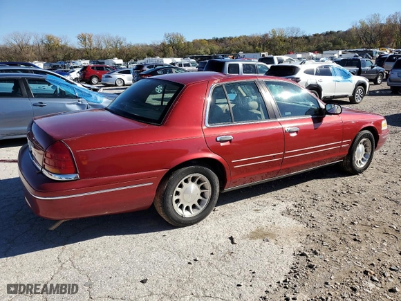 1998 Ford Crown Victoria LX with VIN 2FAFP74W4WX118422, listed as a Copart auction lot 78716184 with 70,214 mi miles and Salvage Title. Bid and sale history available at carsss.com. Image 3.