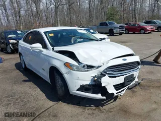 2015 Ford Fusion Energi SE Luxury with VIN 3FA6P0PU0FR272349, listed as a IAAI auction lot 41844130 with 140,353 mi miles. Bid and sale history available at carsss.com. Image 6.
