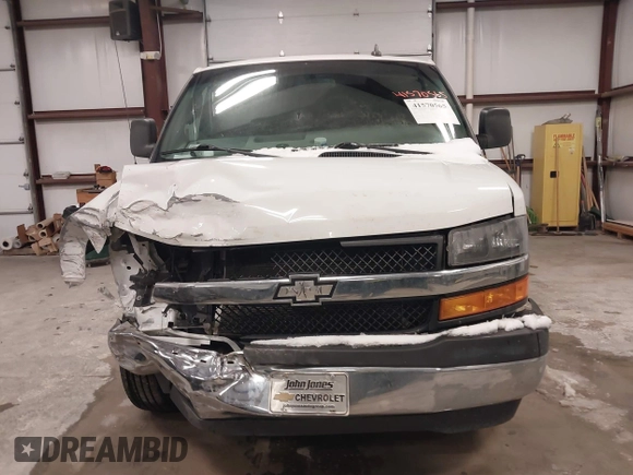 2021 Chevrolet Express Cargo with VIN 1GCWGAFP3M1193924, listed as a IAAI auction lot 41570565 with 70,337 mi miles and . Bid and sale history available at DreamBid. Image 12.