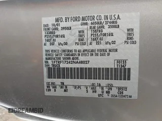 2002 Ford F-150 XL with VIN 1FTRF17242NA48027, listed as a IAAI auction lot 41838636 with 69,821 mi miles. Bid and sale history available at carsss.com. Image 9.