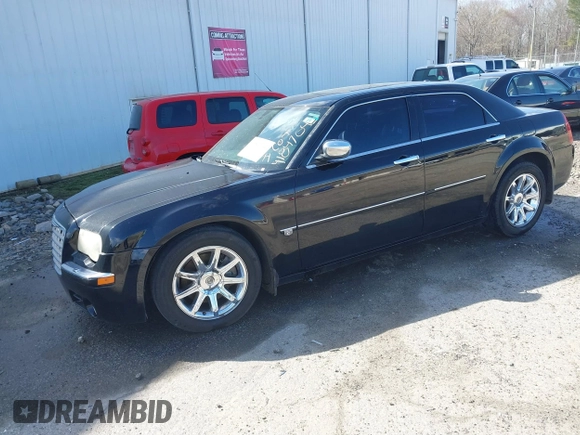 2005 Chrysler 300 with VIN 2C3AA63H65H145122, listed as a IAAI auction lot 41847043 with 237,757 mi miles. Bid and sale history available at carsss.com. Image 2.