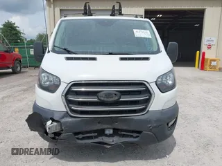 2020 Ford Transit Cargo with VIN 1FTBR1Y87LKA19622, listed as a IAAI auction lot 42479925 with 98,474 mi miles and . Bid and sale history available at DreamBid. Image 6.