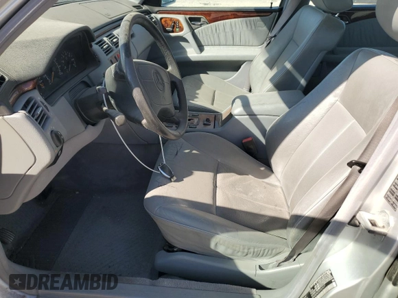 1999 Mercedes-Benz E-Class with VIN WDBJF82H3XX025477, listed as a Copart auction lot 78813364 with 235,541 mi miles and Salvage Title. Bid and sale history available at carsss.com. Image 7.