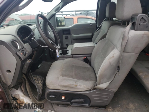 2005 Ford F-150 STX with VIN 1FTRX12W55KB45878, listed as a Copart auction lot 66160994 with 128,212 mi miles and Salvage Title. Bid and sale history available at carsss.com. Image 7.