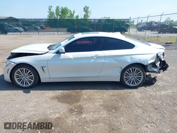 2015 BMW 4 Series 428i xDrive with VIN WBA3N5C52FK484864, listed as a IAAI auction lot 42569077 with 95,431 mi miles and . Bid and sale history available at DreamBid. Image 14.