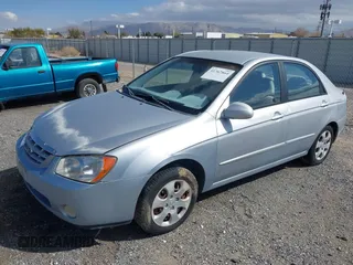 2004 Kia Spectra LX with VIN KNAFE122645052206, listed as a IAAI auction lot 41767864 with 63,866 mi miles. Bid and sale history available at carsss.com. Image 2.