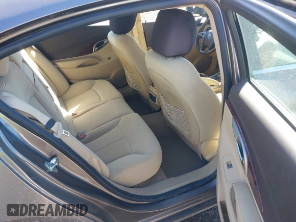2011 Buick LaCrosse CX z VIN 1G4GA5ED7BF287630, wystawiony jako IAAI lot #41585309 z przebiegiem 132 872 mil mil oraz . Historia ofert i sprzedaży dostępna na DreamBid. Obrazek 8.
