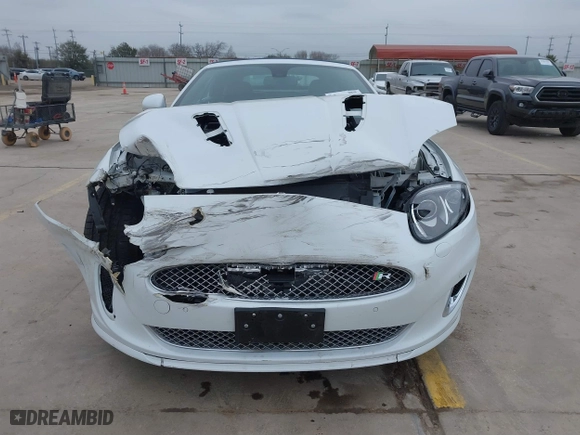 2014 Jaguar XK with VIN SAJWA4EC9EMB52042, listed as a IAAI auction lot 41635233 with 10,566 mi miles. Bid and sale history available at carsss.com. Image 12.