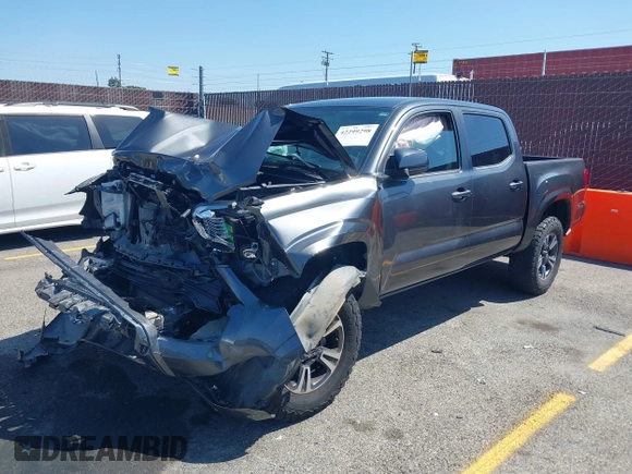 2017 Toyota Tacoma SR5 with VIN 3TMCZ5AN0HM098367, listed as a IAAI auction lot 42299298 with 69,770 mi miles and . Bid and sale history available at DreamBid. Image 2.