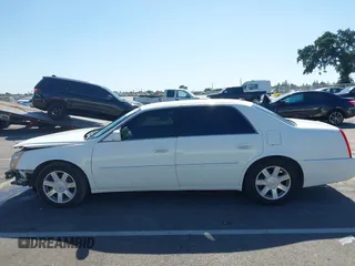 2007 Cadillac DTS Luxury I z VIN 1G6KD57Y77U133267, wystawiony jako IAAI lot #42337188 z przebiegiem 126 063 mil mil oraz . Historia ofert i sprzedaży dostępna na DreamBid. Obrazek 15.