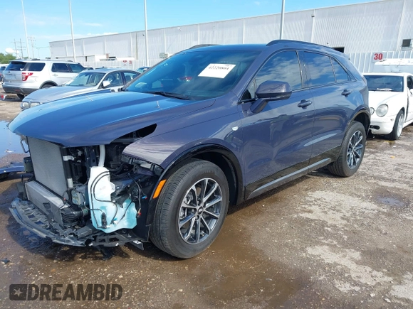 2024 Cadillac XT4 FWD Sport with VIN 1GYFZER40RF226384, listed as a IAAI auction lot 42220804 with 8,743 mi miles and . Bid and sale history available at DreamBid. Image 2.