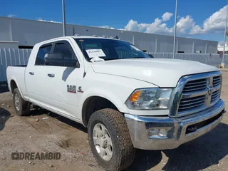 2018 Ram 2500 Big Horn z VIN 3C6UR5ML3JG359629, wystawiony jako IAAI lot #42236067 z przebiegiem 137 450 mil mil oraz . Historia ofert i sprzedaży dostępna na DreamBid. Obrazek 1.