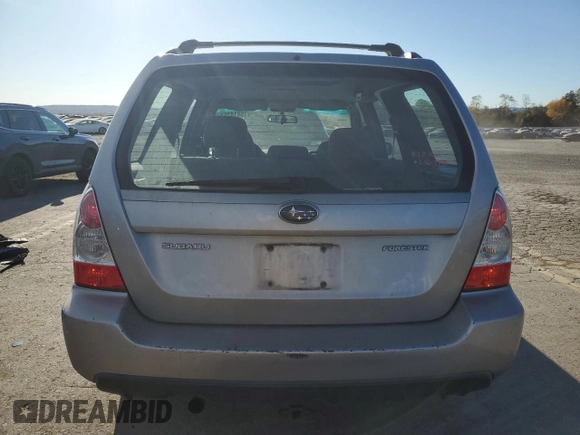 2006 Subaru Forester 2.5 X with VIN JF1SG63696H734935, listed as a Copart auction lot 76814264 with 181,000 mi miles and Salvage Title. Bid and sale history available at carsss.com. Image 6.