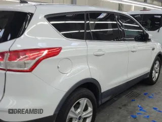 2016 Ford Escape SE z VIN 1FMCU0GX3GUC30456, wystawiony jako IAAI lot #42387320 z przebiegiem 99 033 mil mil oraz . Historia ofert i sprzedaży dostępna na DreamBid. Obrazek 21.