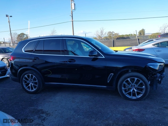 2023 BMW X5 sDrive40i with VIN 5UXCR4C06P9N83023, listed as a IAAI auction lot 41513687 with 42,211 mi miles. Bid and sale history available at carsss.com. Image 14.