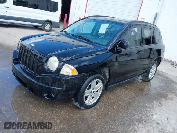 2007 Jeep Compass Sport with VIN 1J8FT47W57D119595, listed as a IAAI auction lot 41782027 with 223,203 mi miles. Bid and sale history available at carsss.com. Image 2.