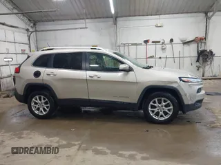 2014 Jeep Cherokee Latitude z VIN 1C4PJMCB0EW291782, wystawiony jako IAAI lot #42124092 z przebiegiem 170 265 mil mil oraz . Historia ofert i sprzedaży dostępna na DreamBid. Obrazek 13.