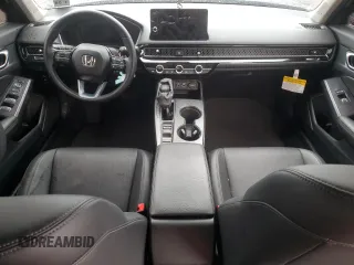 2024 Honda Civic Touring z VIN 2HGFE1F97RH316075, wystawiony jako Copart lot #50006805 z przebiegiem Nie podano mil oraz Szkoda całkowita • Salvage title. Historia ofert i sprzedaży dostępna na DreamBid. Obrazek 8.