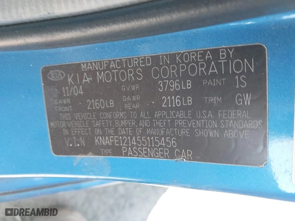 2005 Kia Spectra LX with VIN KNAFE121455115456, listed as a IAAI auction lot 41884180 with 373,335 mi miles. Bid and sale history available at carsss.com. Image 9.