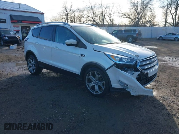 2017 Ford Escape Titanium with VIN 1FMCU9J98HUA04994, listed as a IAAI auction lot 41139988 with 136,989 mi miles. Bid and sale history available at carsss.com. Image 1.