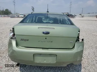 2008 Ford Focus SE z VIN 1FAHP33NX8W141079, wystawiony jako Copart lot #59759325 z przebiegiem 71 522 mil mil oraz Szkoda całkowita • Salvage title. Historia ofert i sprzedaży dostępna na DreamBid. Obrazek 6.