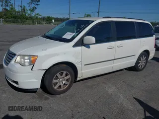 2010 Chrysler Town & Country Touring with VIN 2A4RR5D11AR493086, listed as a IAAI auction lot 42012604 with 154,204 mi miles and . Bid and sale history available at DreamBid. Image 2.
