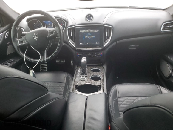 2019 Maserati Ghibli with VIN ZAM57XSS3K1319197, listed as a Copart auction lot 70454084 with 28,584 mi miles and Salvage Title. Bid and sale history available at carsss.com. Image 8.