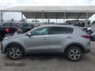 2020 Kia Sportage LX with VIN KNDPM3AC1L7761371, listed as a IAAI auction lot 42121834 with 38,411 mi miles and . Bid and sale history available at DreamBid. Image 14.