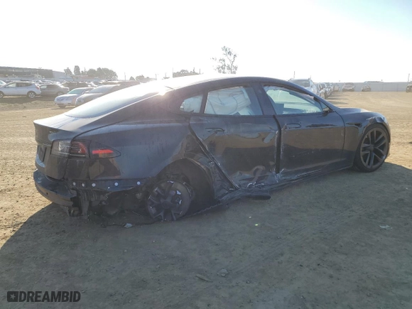2023 Tesla Model S with VIN 5YJSA1E52PF499802, listed as a Copart auction lot 88585675 with 0 mi miles and Salvage Title. Bid and sale history available at carsss.com. Image 3.