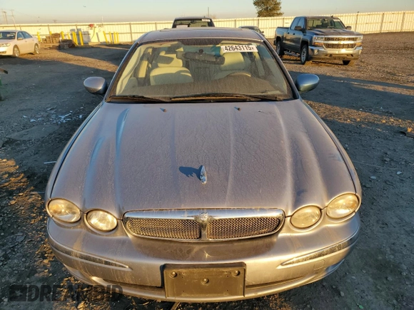 2007 Jaguar X-Type z VIN SAJWA51A27WJ21259, wystawiony jako Copart lot #42643115 z przebiegiem 106 800 mil mil oraz Szkody całkowita. Historia ofert i sprzedaży dostępna na DreamBid. Obrazek 5.