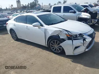 2016 Lexus ES 300h with VIN JTHBW1GGXG2113791, listed as a IAAI auction lot 41116740 with 188,974 mi miles and . Bid and sale history available at DreamBid. Image 1.
