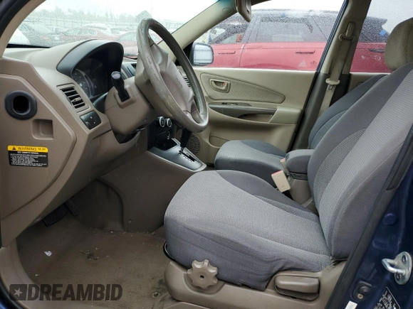 2009 Hyundai Tucson GLS with VIN KM8JM12B89U009365, listed as a Copart auction lot 67215704 with 157,475 mi miles and Salvage Title. Bid and sale history available at carsss.com. Image 7.