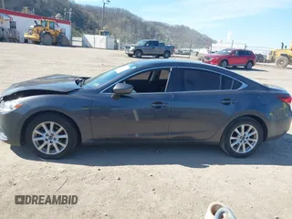 2016 Mazda 6 i Sport with VIN JM1GJ1U54G1413244, listed as a IAAI auction lot 42062416 with 148,970 mi miles and . Bid and sale history available at DreamBid. Image 14.