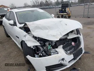2014 Jaguar XF SC with VIN SAJWA0EX0E8U09381, listed as a IAAI auction lot 41783386 with 27,730 mi miles and . Bid and sale history available at DreamBid. Image 6.