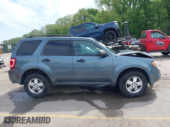 2012 Ford Escape XLT z VIN 1FMCU9DG7CKB91272, wystawiony jako IAAI lot #42168619 z przebiegiem 119 011 mil mil oraz . Historia ofert i sprzedaży dostępna na DreamBid. Obrazek 13.