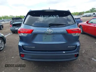 2019 Toyota Highlander SE with VIN 5TDJZRFH2KS975689, listed as a IAAI auction lot 42250723 with 88,043 mi miles and . Bid and sale history available at DreamBid. Image 16.