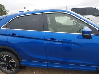 2024 Mitsubishi Eclipse Cross SE z VIN JA4ATWAA5RZ001492, wystawiony jako IAAI lot #41281253 z przebiegiem 25 221 mil mil oraz . Historia ofert i sprzedaży dostępna na DreamBid. Obrazek 14.