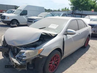 2014 Toyota Camry L with VIN 4T4BF1FK5ER391296, listed as a IAAI auction lot 41935100 with 177,571 mi miles. Bid and sale history available at carsss.com. Image 2.