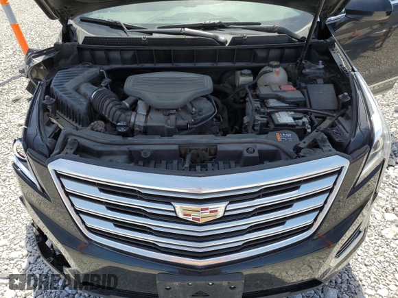 2017 Cadillac XT5 FWD with VIN 1GYKNARS2HZ131243, listed as a Copart auction lot 54189395 with 134,324 mi miles and Salvage Title. Bid and sale history available at DreamBid. Image 12.