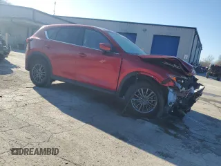 2021 Mazda CX-5 Touring with VIN JM3KFBCM8M0459730, listed as a Copart auction lot 50809505 with 28,828 mi miles and Salvage Title. Bid and sale history available at carsss.com. Image 4.