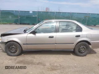2000 Honda Civic LX with VIN 1HGEJ6670YL030749, listed as a IAAI auction lot 42112694 with 153,903 mi miles. Bid and sale history available at carsss.com. Image 14.