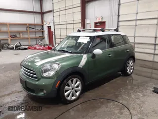 2015 MINI Countryman with VIN WMWZB3C50FWR43714, listed as a IAAI auction lot 41589778 with 93,404 mi miles and . Bid and sale history available at DreamBid. Image 2.