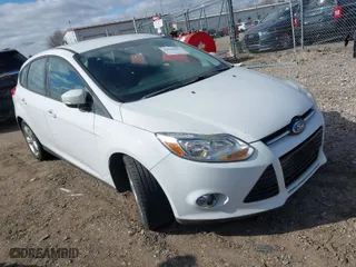 2012 Ford Focus SE with VIN 1FAHP3K27CL311240, listed as a IAAI auction lot 42029992 with 166,688 mi miles. Bid and sale history available at carsss.com. Image 1.