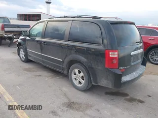 2008 Dodge Grand Caravan SXT with VIN 2D8HN54P48R827298, listed as a IAAI auction lot 41972302 with 199,903 mi miles and . Bid and sale history available at DreamBid. Image 3.