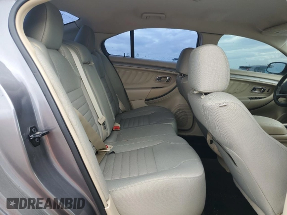 2014 Ford Taurus SE z VIN 1FAHP2D86EG143517, wystawiony jako Copart lot #51066975 z przebiegiem 134 892 mil mil oraz Szkoda całkowita • Salvage title. Historia ofert i sprzedaży dostępna na DreamBid. Obrazek 10.